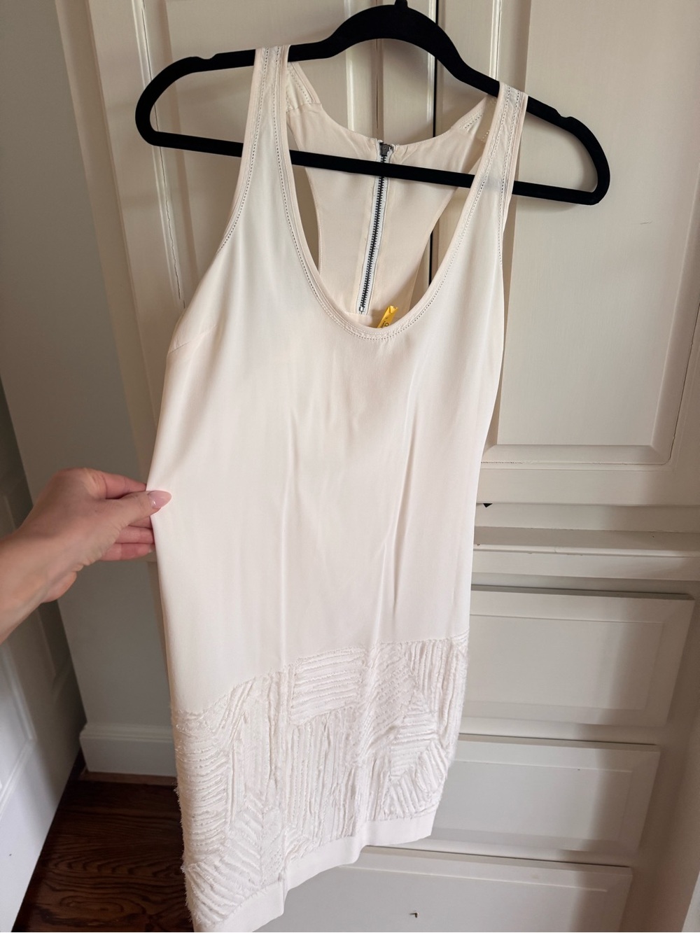 Sleeveless Cream Midi Dress with Textured Hem